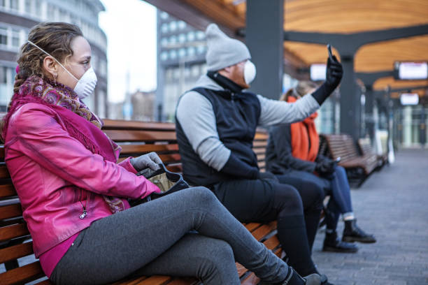istock Commuters social distancing at a station 1218017223