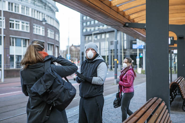 istock Commuters social distancing at a station 1218017477