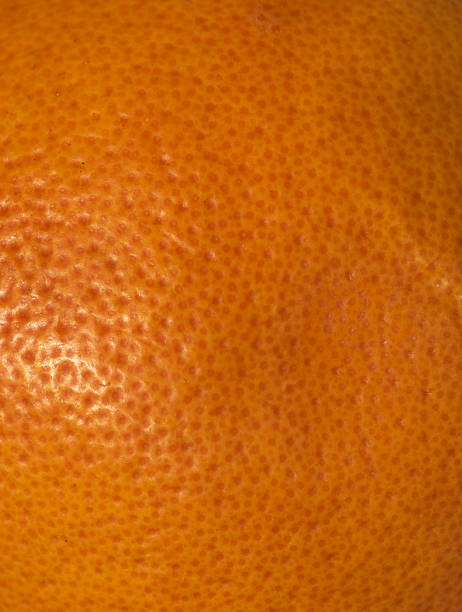 istock orange peel with visible texture. macro photo 1218017759