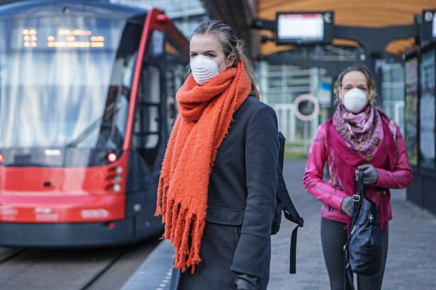 istock Female commuter using public transport during virus outbreak 1218017822