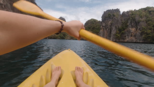 Kayaking in a Lake with Dramatic Rock Formations