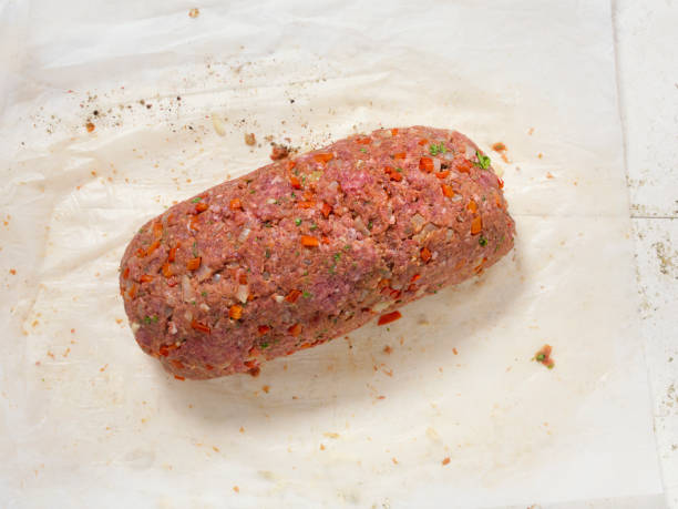 istock Preparing Sicilian Style Rolled Meatloaf with Deli Ham, Basil and Mozzarella - Step 7of8 1218026198