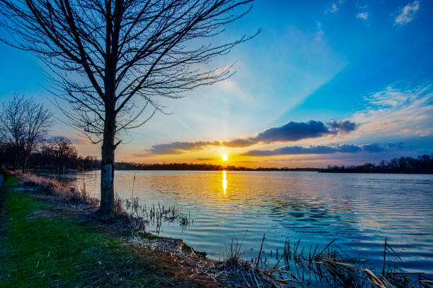istock Sunbeams at Sunset over Lake 1218027768