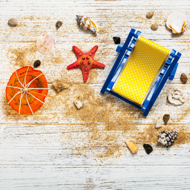 Beach accessories on wooden board