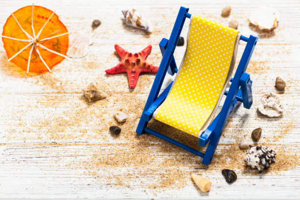 Beach accessories on wooden board