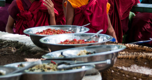  Pindaya, Myanmar - March 20,2011:Burmese nuns celebrate Pindaya Caves Festival, Pindaya, Shan State in Myanmar.Pindaya, a three hour drive from Helo is a city located in the hills of the Shan State.