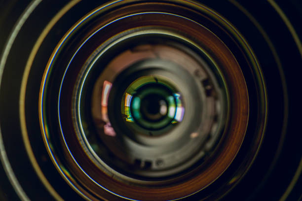 Camera lens on black background. Aperture blades. Camera lens close up