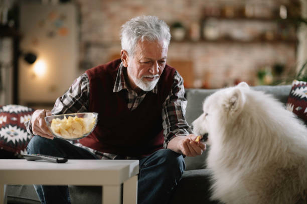 istock Senior man with his best friend. 1218039505