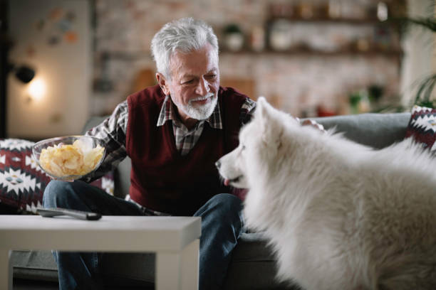 istock Senior man with his best friend. 1218039545