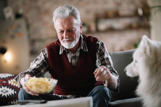 istock Senior man with his best friend. 1218040188