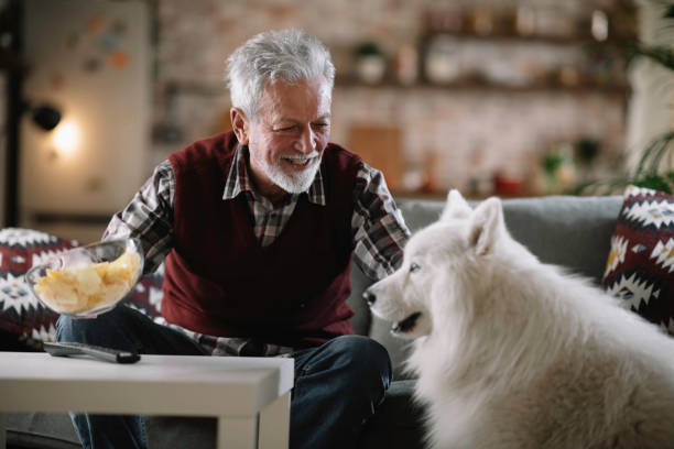 istock Senior man with his best friend. 1218040189