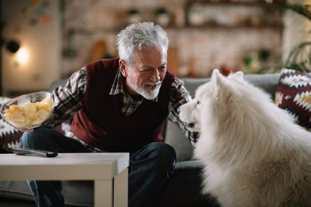 istock Senior man with his best friend. 1218040222