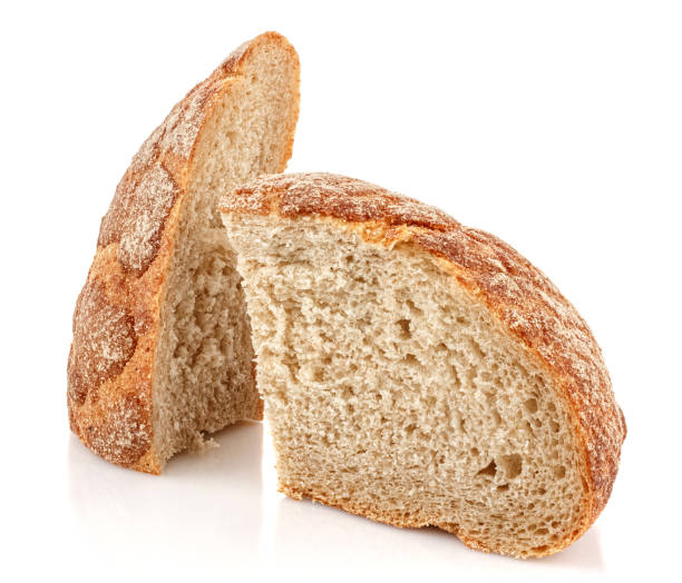 istock Two chunks of rye bread isolated on white background with reflection on glossy surface 1218047195