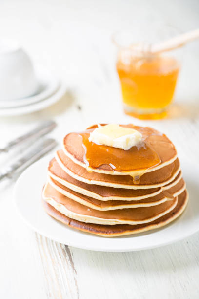 istock Pancakes with Butter and Honey 1218047565
