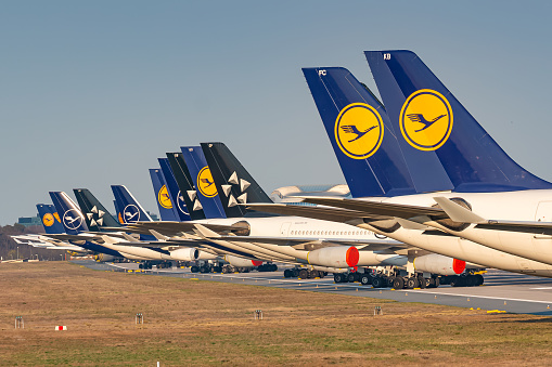 Frankfurt, Germany - April 7, 2020: Lufthansa Airbus A330 and A340 grounded and stored at Frankfurt airport (FRA) in the Germany. Airbus is an aircraft manufacturer from Toulouse, France.