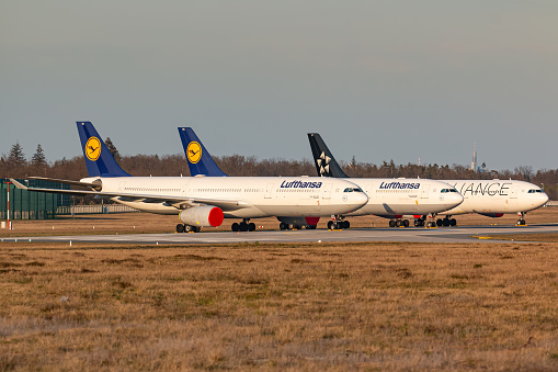 Frankfurt, Germany - April 7, 2020: Lufthansa Airbus A330 and A340 grounded and stored at Frankfurt airport (FRA) in the Germany. Airbus is an aircraft manufacturer from Toulouse, France.