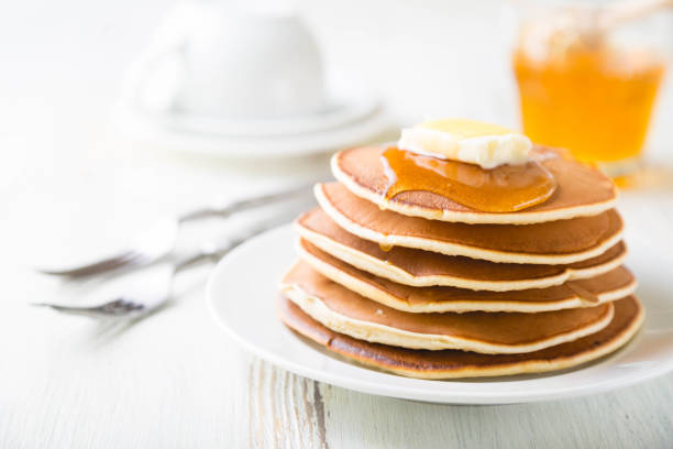 istock Pancakes with Butter and Honey 1218047721