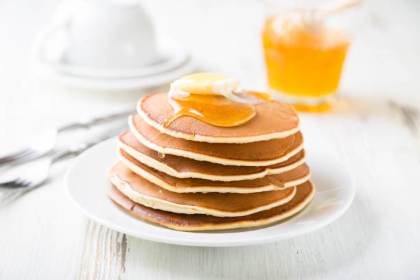 istock Pancakes with Butter and Honey 1218047729