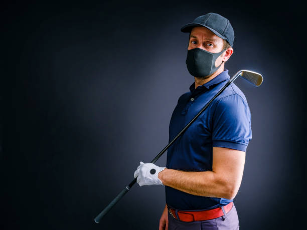 golf player with golf club and protection mask - golf swing golf golf club golf ball imagens e fotografias de stock