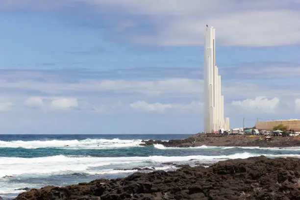 Photo of Punta del Hidalgo lighthouse by rough sea in Tenerife