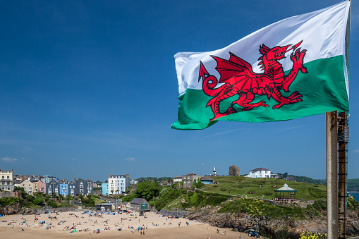 3D rendering of the flag of Wales with a soccer ball