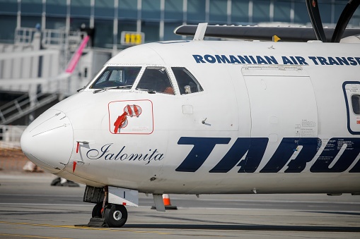 Otopeni, Romania - April 9, 2020: Tarom (the operating airline of Romania) airplane on Henri Coanda International Airport.