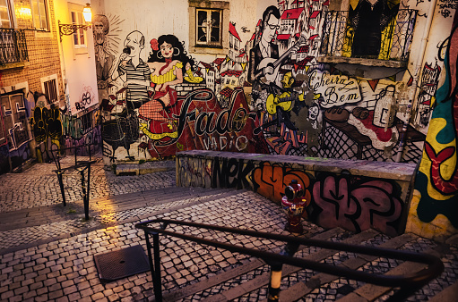 Lisbon, Portugal - February 3, 2019: The famous fado vadio street art murales in mouraria district, Lisbon, on february 3, 2019, with iconic singers of the traditional portuguese fado music