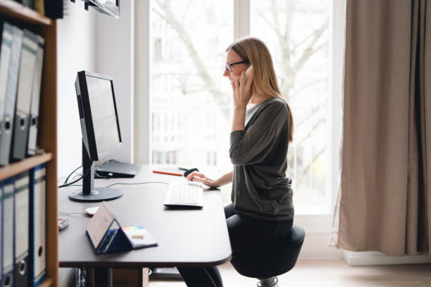 istock Woman working at home 1218060609