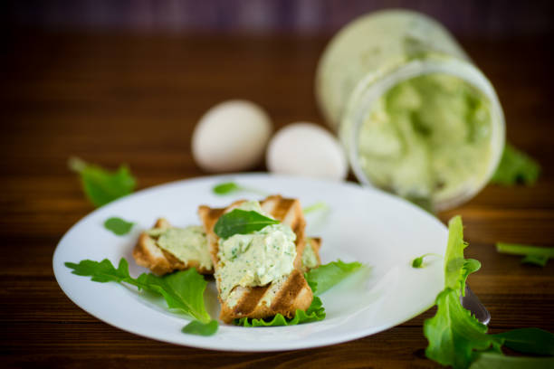 istock green bread spread of arugula, curds and eggs with fried toast 1218064989