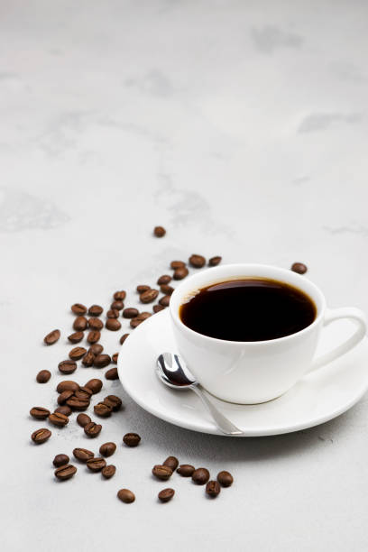 istock cup of black coffee on a light background 1218065006