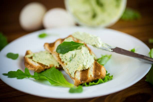 istock green bread spread of arugula, curds and eggs with fried toast 1218065067