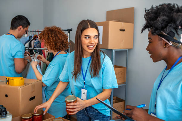 istock Small mixed race group of people working in charitable foundation. 1218067736