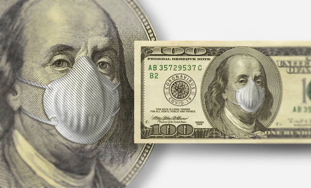istock Hundred Dollar Bill with mouthguard for COVID-19 Corona Virus 1218067800