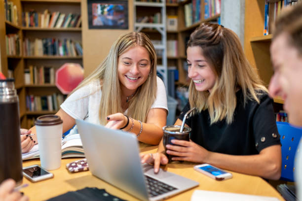 Students drink mate while study stock photo