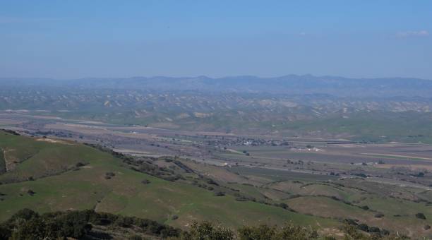 istock Green rolling hills of Monterey County CA dotted with Oak trees 1218072077