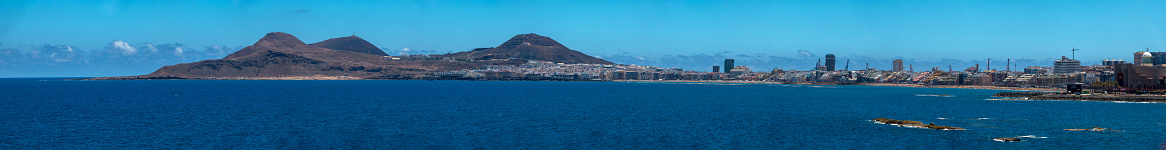 Full panoramic view of the city of Las Palmas de Gran Canaria in the Canary Islands (Spain) from the sea. City life