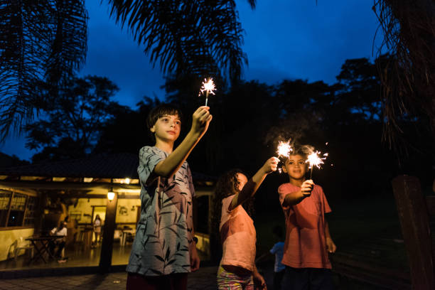 istock Children with sparklers in the new year 1218079934