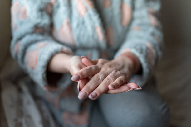 istock Woman applying hand cream 1218080835
