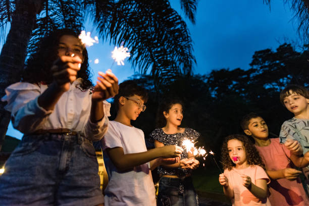 istock Children with sparklers in the new year 1218080968