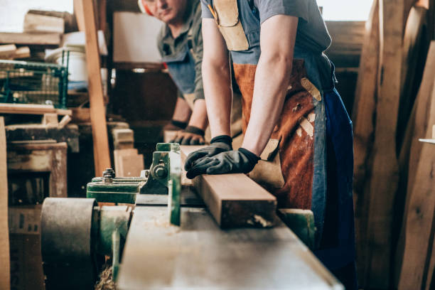 istock Carpenters working in wood workshop 1218081062