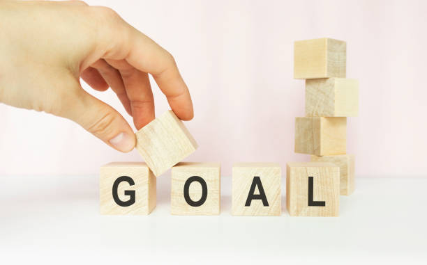 istock woman hand holding wooden cube with flip over block CHANGE to CHANCE word on withe table background. success, strategy, solution, business and Positive thinking concepts with space for advertisers. 1218082410