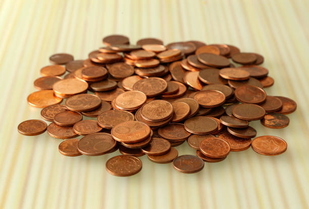 istock Small euro cent coins in a close-up 1218084618