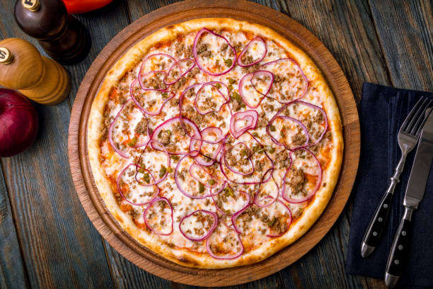 Pizza with tuna and red onion stock photo
