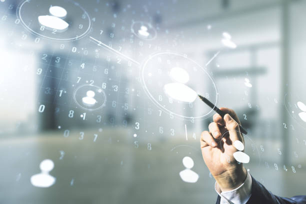 istock Man hand with pen working with abstract virtual social network hologram on blurred office background. Double exposure 1218085054