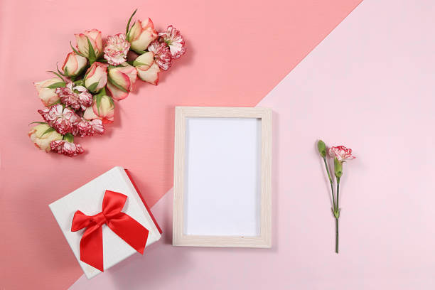 istock Flowers with holiday box, abstract floral background, spring banner. Creative modern bouquet, minimal holiday concept. Postcard for mother's day, women's day 1218086710