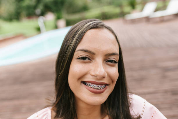 istock young smiling latin woman 1218087394