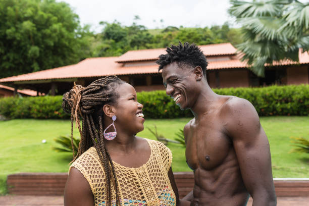 istock smiling couple in home yard 1218087420