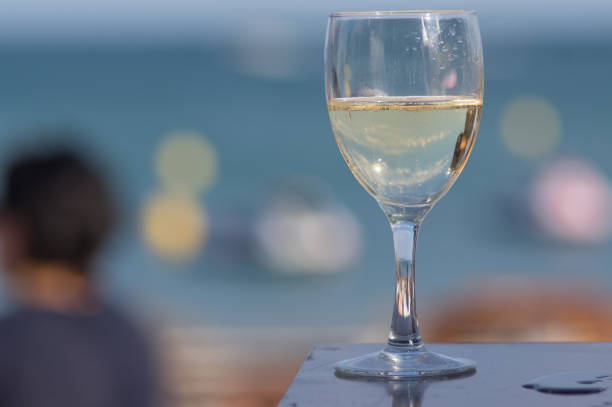istock glass of white wine 1218087620