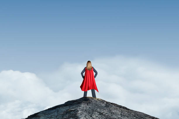 istock Female Hero On Mountain Peak 1218091653