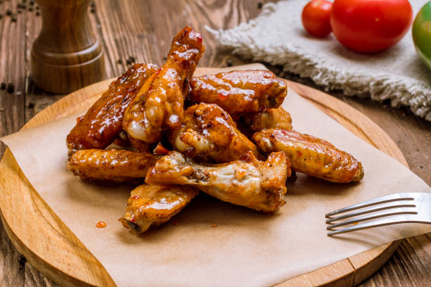 istock Chicken wings in sweet chili sauce 1218096724